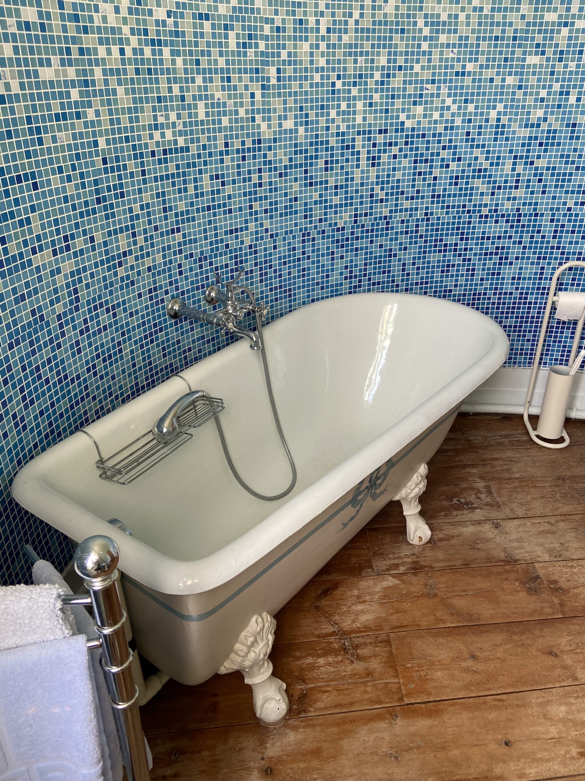 Bed & Breakfast blue tile bathroom with tub